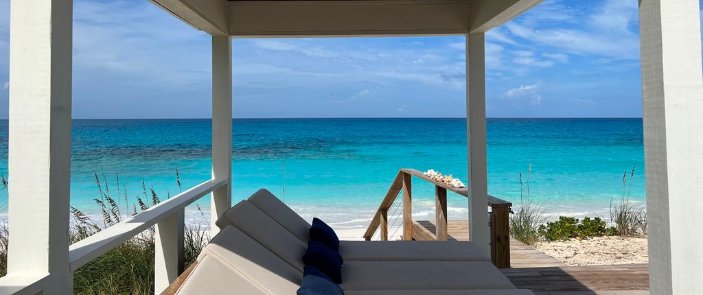 Beau Soleil Beach House beside the turquoise water in Exuma