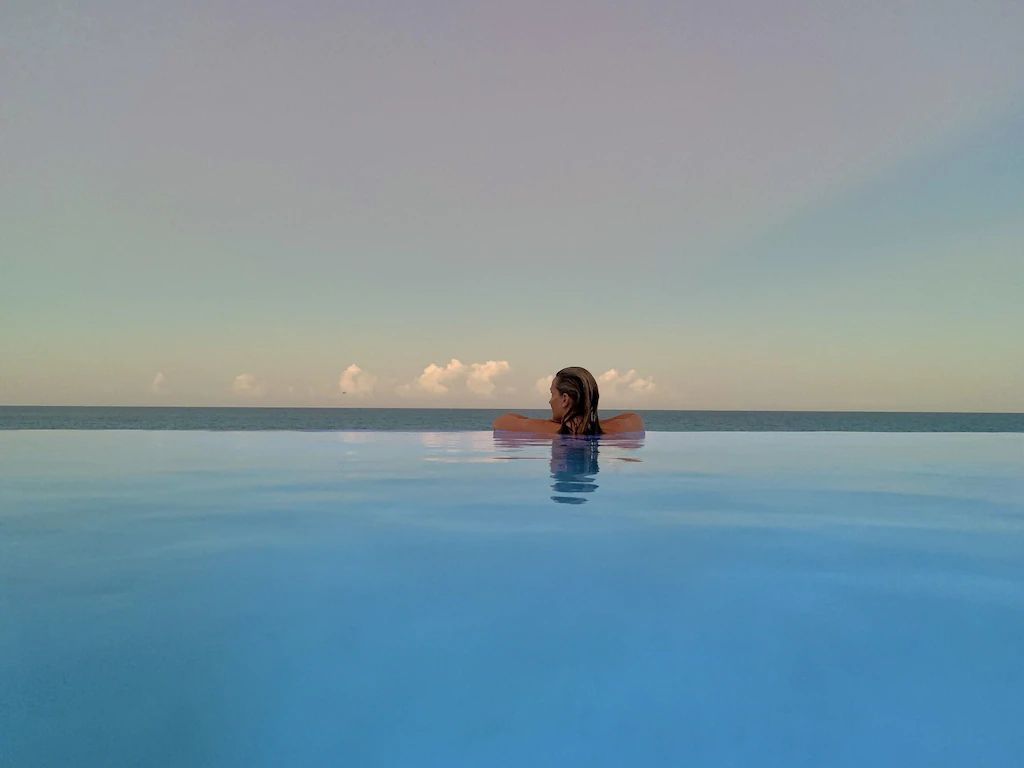 Pool deck overlooking the ocean at Beau Soleil Beach House
